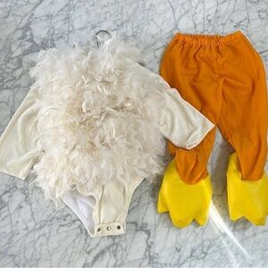 White Feathered Costume with Orange Pants